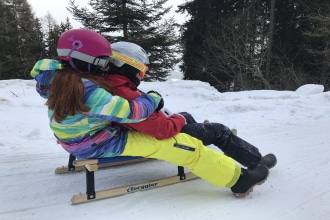 Slittare con bambini in Alto Adige