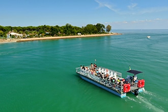 Spiaggia di Bibione con i bambini, in barca