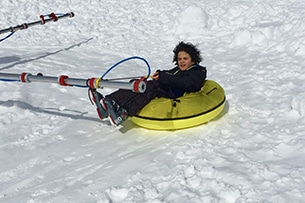 Vallese inverno con bambini, Nendaz, ciambelle