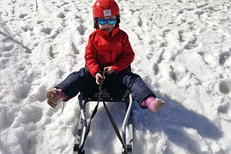 Vacanze con bambini al Cavallino Bianco a San Candido, lo slittino