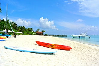 Maldive con bambini, lezioni di surf