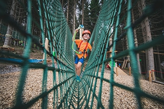 Alpe Cermis con i bambini in estate, parco avventura