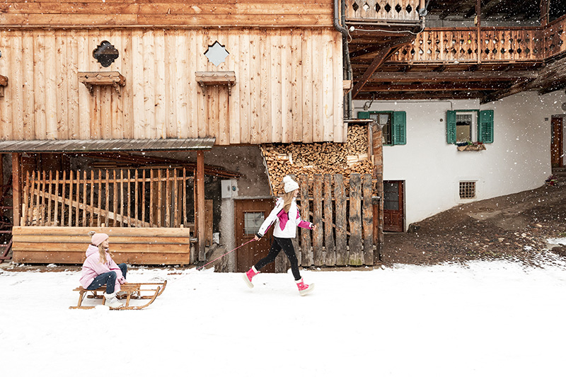 In Val di Fiemme d'inverno con i bambini, slittino